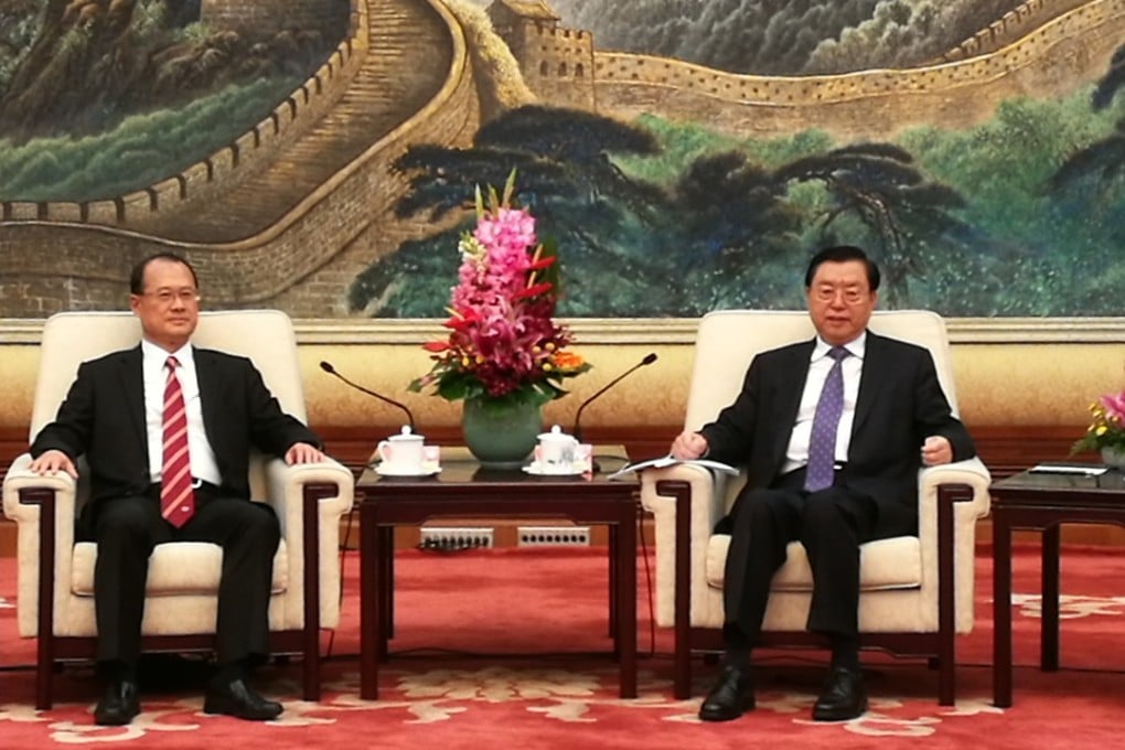 NPC chairman Zhang Dejiang (right) meets the Chinese General Chamber of Commerce delegation in the Great Hall of the People in Beijing. Photo: Handout