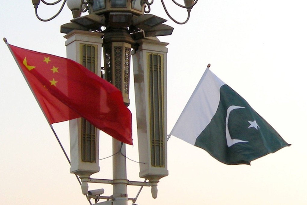 Chinese and Pakistani national flags flutter on a lamp post in Tiananmen Square in Beijing. Photo: ImagineChina