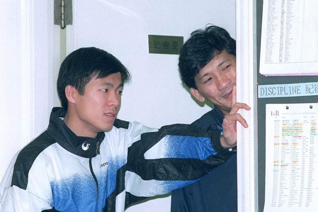 Former soccer player Lee Wai-man (left, with Tong Yuen-sing) suffered light facial injuries during the incident. Photo: Martin Chan