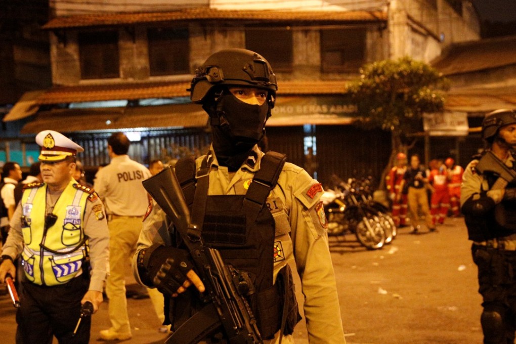 Police guard the scene of an explosion in Jakarta, Indonesia May 24, 2017. One police officer and the suicide bomber perished in the blasts which rocked the city. Photo: Reuters