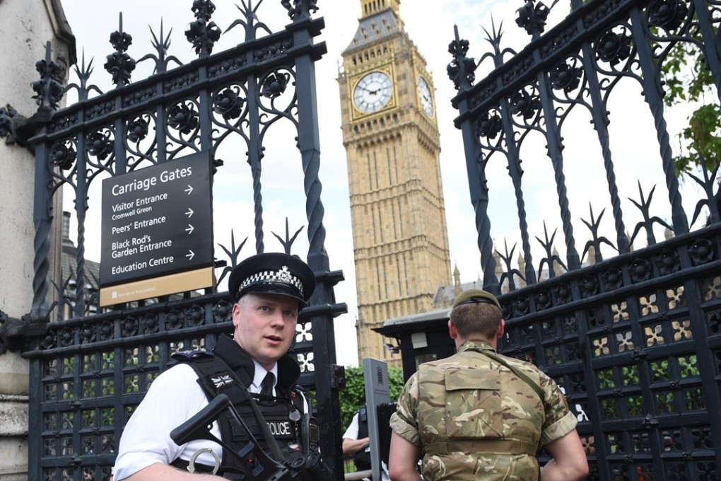 British Army soldiers along with armed police patrol the streets near the Houses of Parliament in London, Britain, on May 24, 2017. Britain criticised the US for leaks in the investigation of the Manchester terror attack. Photo: EPA