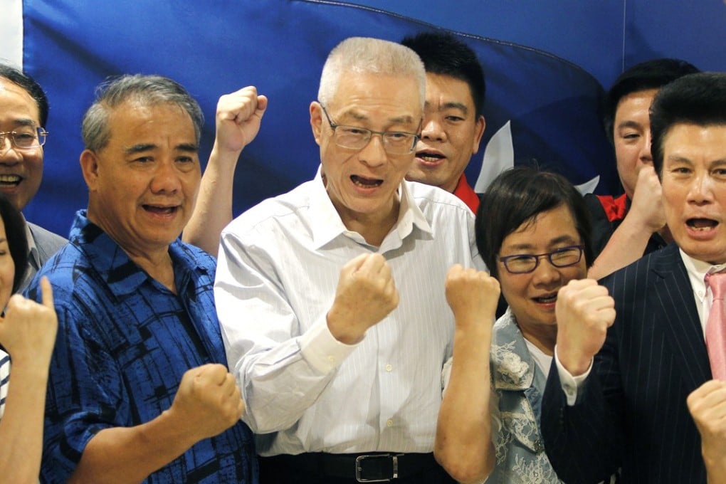 Wu Den-yih (centre) and his supporters declare victory in the election for Kuomintang chairman, in Taipei on May 20. Photo: AP