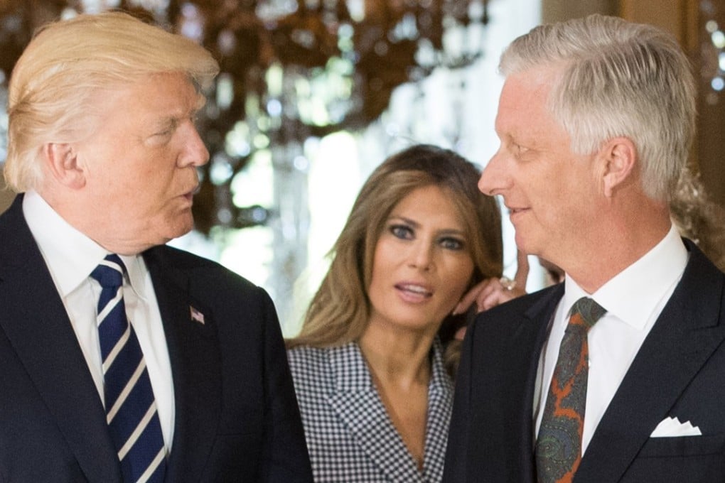US President Donald Trump (left), King Philippe of Belgium and First Lady of the US Melania Trump pose prior to a reception at the Royal Palace in Brussels, on Wednesday. Photo: AFP