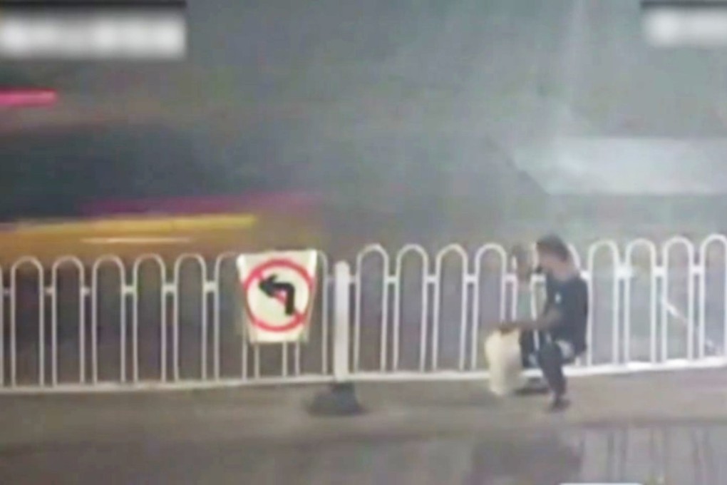 The man stuck in the barrier in Anhui province. A passer-by alerted the police. Photo: Handout