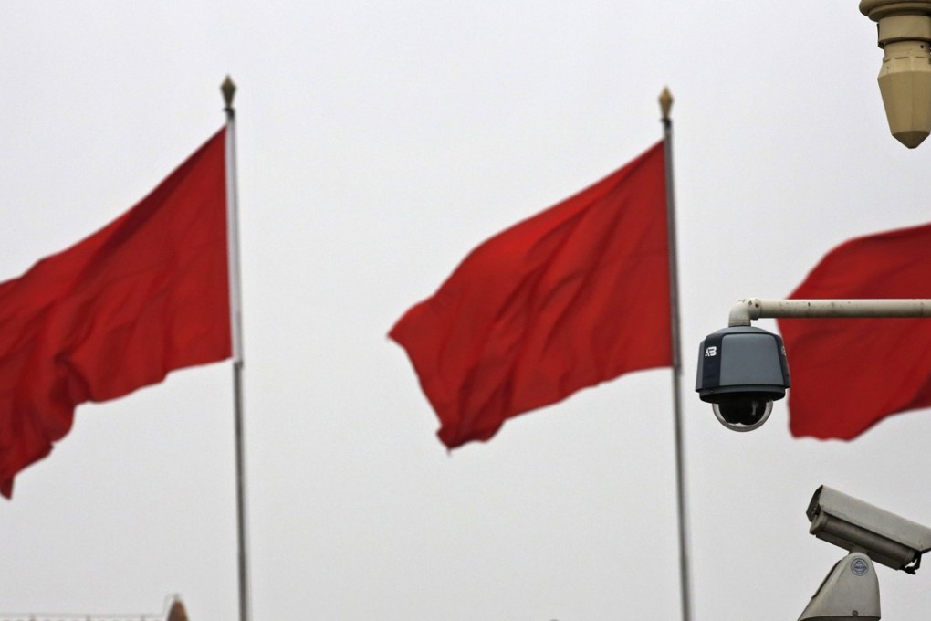 A security camera keeps watch over Tiananmen Square in Beijing. Activists say they already face extensive surveillance by security agents and cameras outside their homes. Photo: Reuters