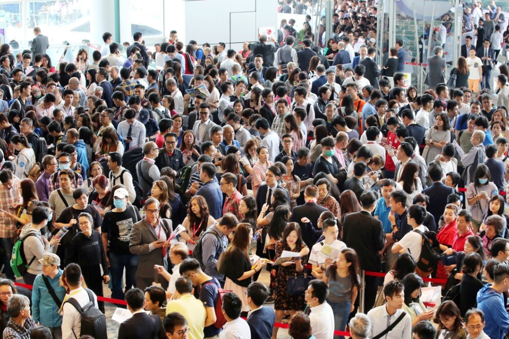 Thousands flocked to the opening sales of CK Property’s Ocean Pride flats on Friday, despite tighter mortgage lending rules to cool the Hong Kong property market. Photo: Edward Wong
