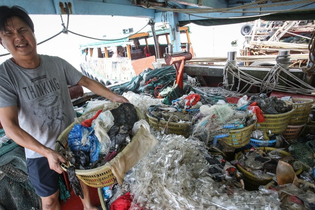 A Cheung Chau fisherman with marine littler. Pictures: SCMP