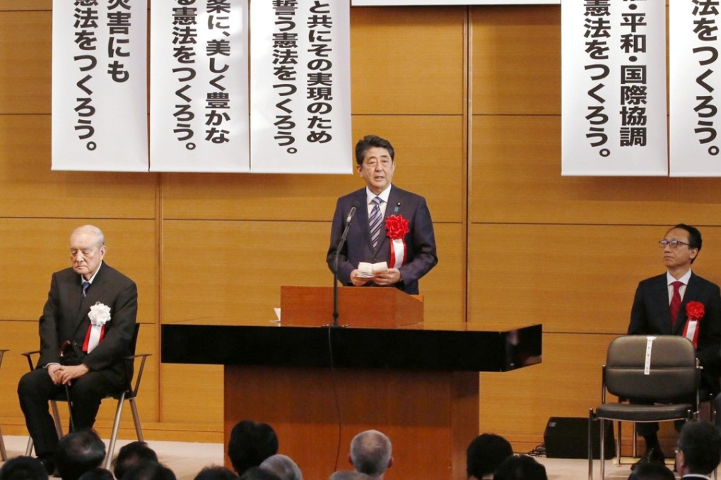 Shinzo Abe addresses a cross-party league of lawmakers in favour of constitutional reform, in Tokyo on May 1. Photo: Kyodo