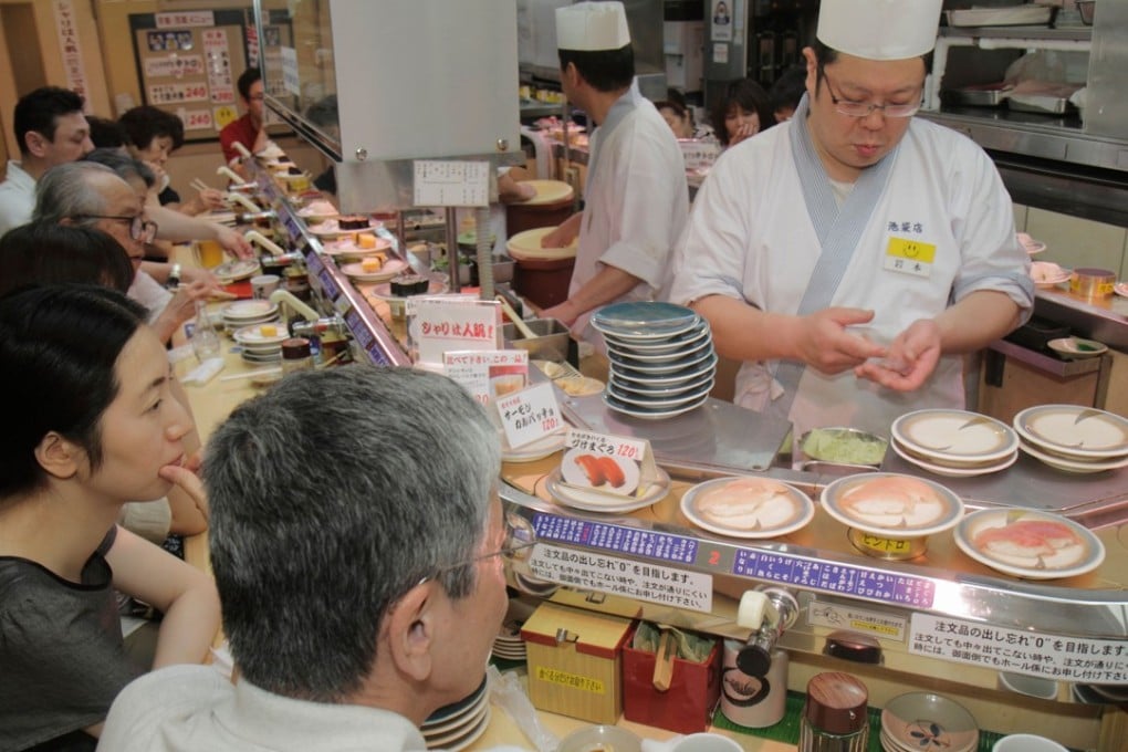 A sushi bar in Tokyo. Chinese were eating raw fish thousands of years ago. Picture: Alamy