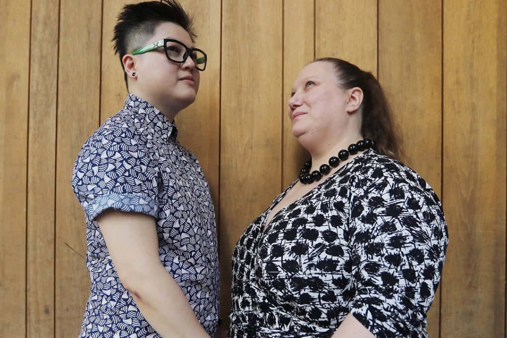 Couple Abby Lee (left) and Betty Grisoni say the new bill still discriminates against the LGBT community. Photo: Edward Wong