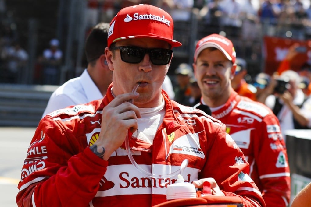 Ferrari driver Kimi Raikkonen (left) with Sebastian Vettel after qualifying in Monaco. Photo: AP