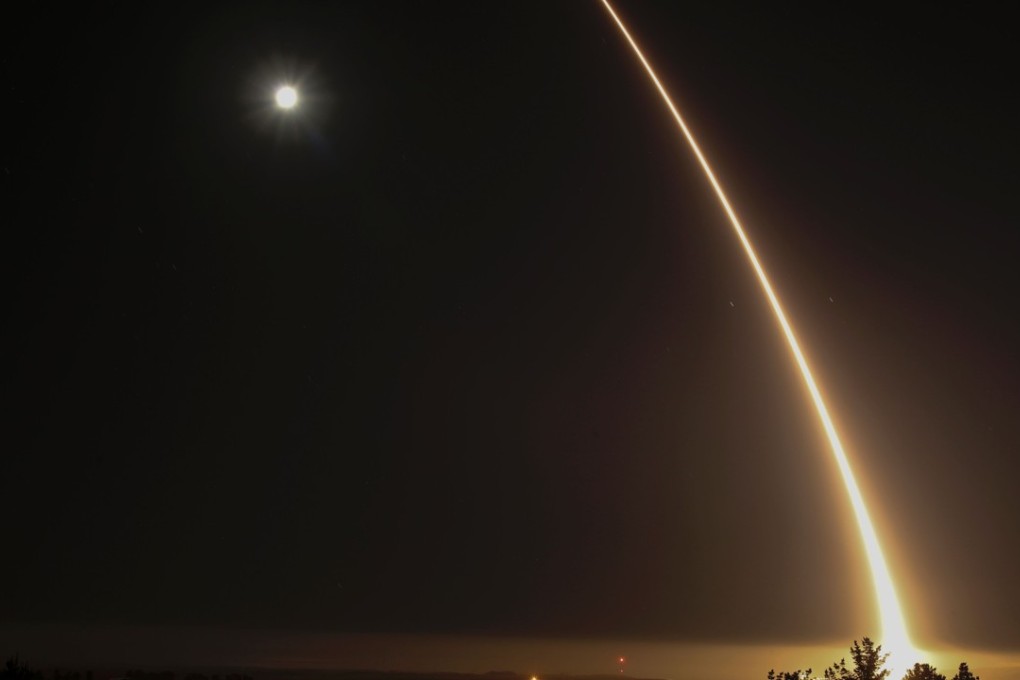 A streak of light trails off into the night sky as the US military test fires an unarmed intercontinental ballistic missile (ICBM) at Vandenberg Air Force Base, some 130 miles (209 kms) northwest of Los Angeles, California. Photo: AFP