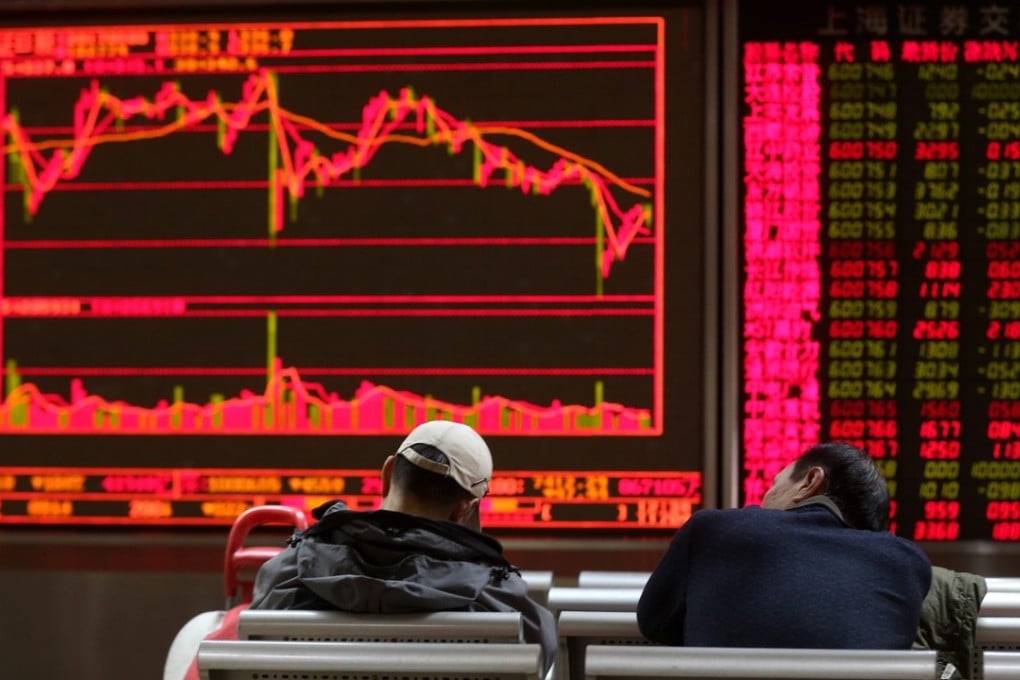 China’s stock markets face an overhang of 5.4 trillion yuan worth of stocks pledged as borrowing collaterals, which stand the risk of being sold off as the markets continue to fall and companies are forced to deleverage to cut risks. Photo: EPA