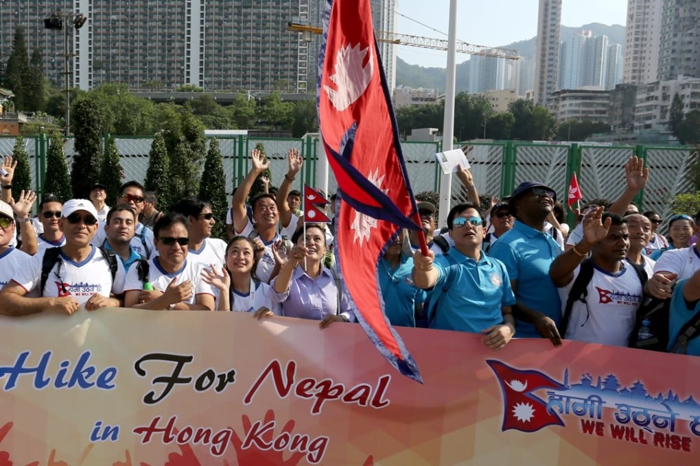 Hundreds of Nepalese hiking up Lion Rock Peak to celebrating Mount Everest Day. Photo: Jonathan Wong