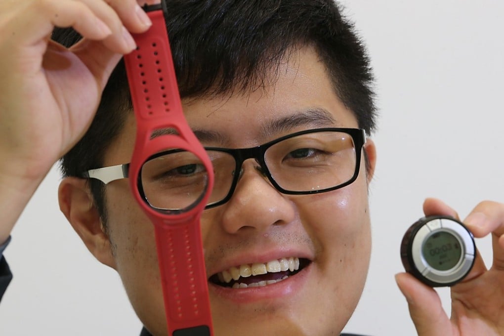 Heartisans co-founder Tim Lui Hin-wai with his company’s wearable technology in Sha Tin. Photo: David Wong
