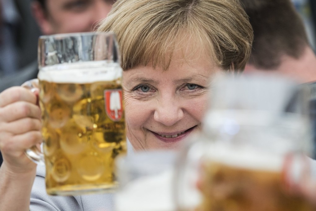 Speaking at a campaign event held in a Bavarian beer tent, Angela Merkel suggested that the G7 summit in Italy that ended Saturday had served as something of a wakeup call. Photo: EPA