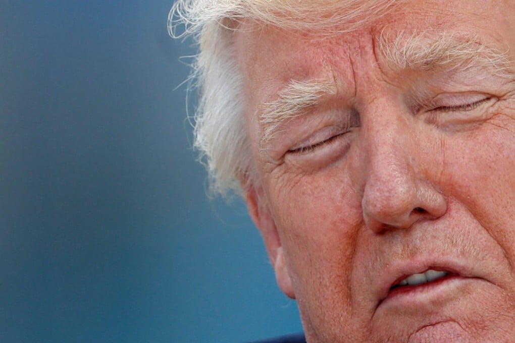 US President Donald Trump, pictured at the start of the Nato summit in Brussels last week, believes the crisis surrounding the expanding Russian investigation is more a communication problem than a legal problem. Photo: Reuters