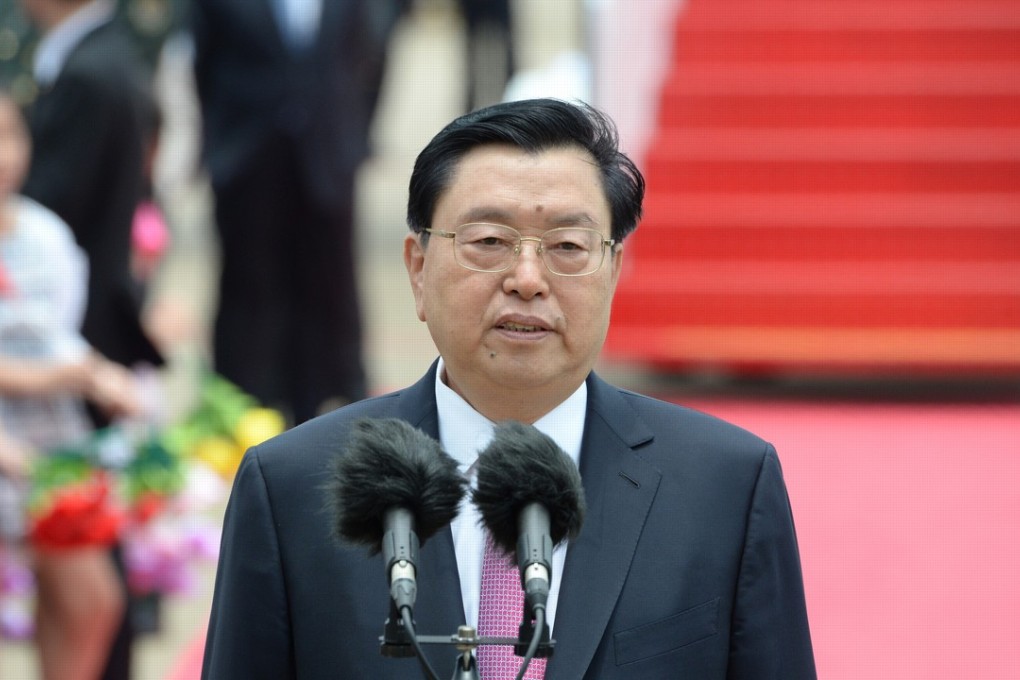 Zhang Dejiang called on the Hong Kong government to ‘steadfastly implement the constitutional obligation of national security’. Photo: GCS