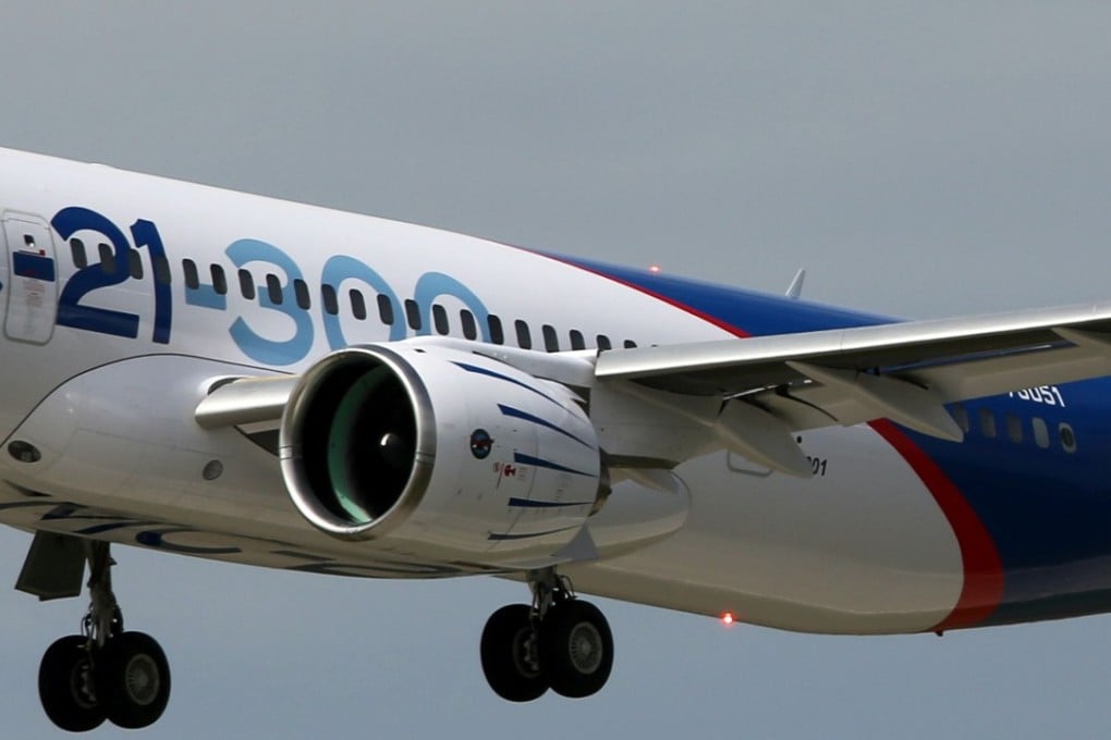 A handout picture taken and released on Sunday by the Irkut Corporation shows its MC-21 medium-haul passenger jet during a test flight in Irkutsk. Photo: AFP