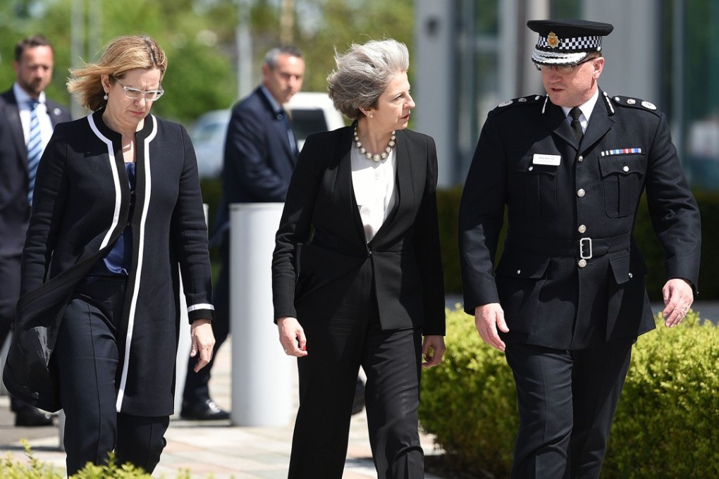 Britain's Prime Minister Theresa May (centre) walks with Chief Constable of Greater Manchester Police, Ian Hopkins (right) and Britain's Home Secretary Amber Rudd , as May arrives at the force's headquarters in Manchester last Tuesday, a day after the deadly terror attack at the Manchester Arena. Photo: AFP