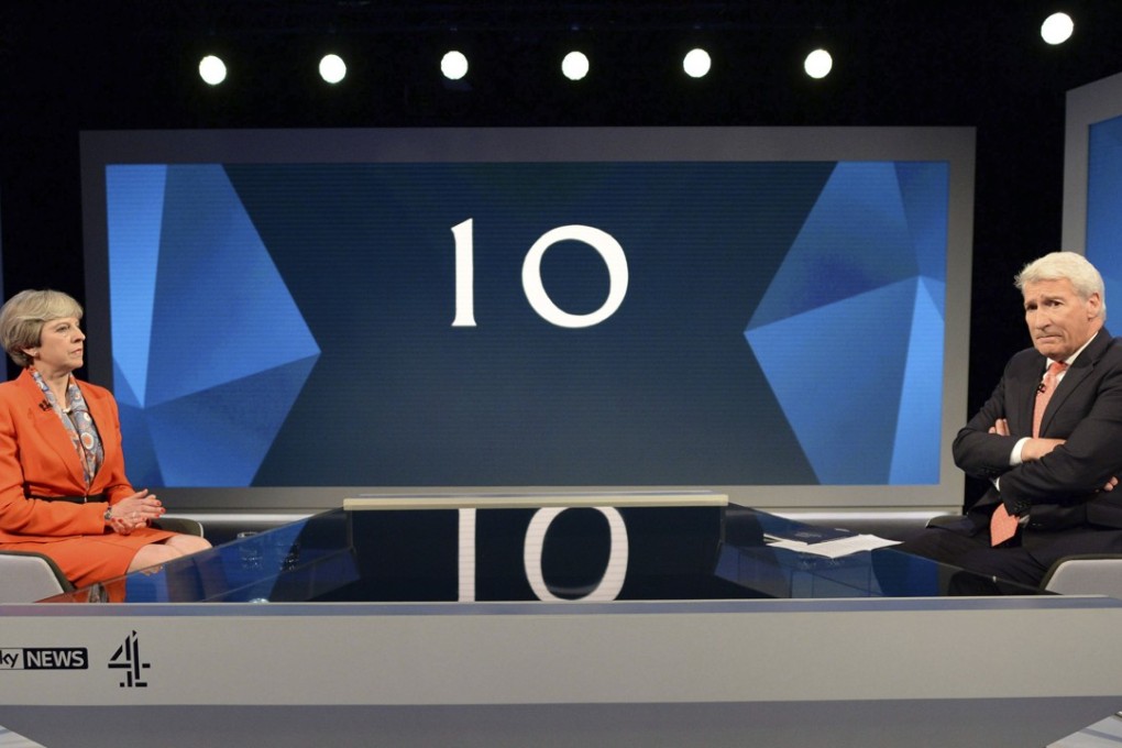 Britain's Prime Minister Theresa May is interviewed by broadcaster Jeremy Paxman, during a general election broadcast, in London on Monday. Photo: AP