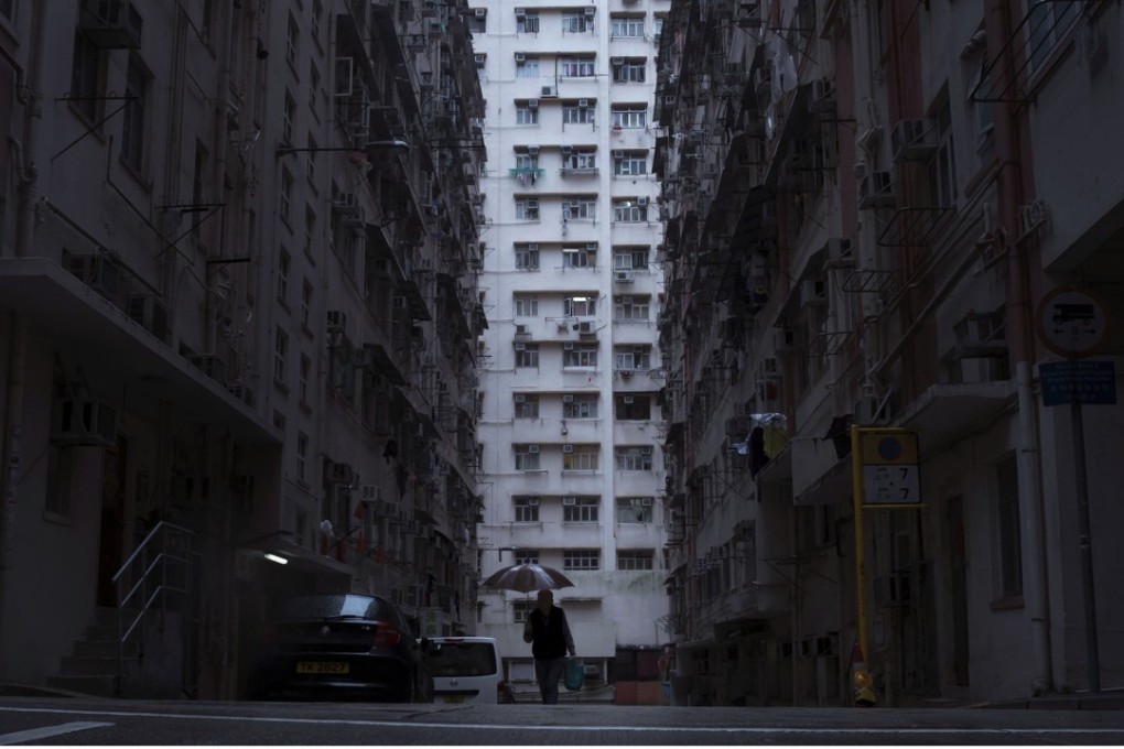 In wealthy Hong Kong, there's a dark side to the housing boom, with hundreds of thousands of people forced to live in partitioned shoebox apartments, so-called "coffin homes" and other inadequate housing. Photo: AP