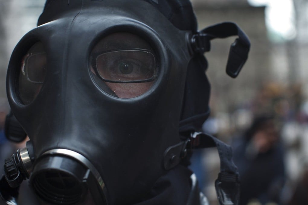 A file picture of demonstrator wearing a gas mask during a protest in New York. Photo: Reuters