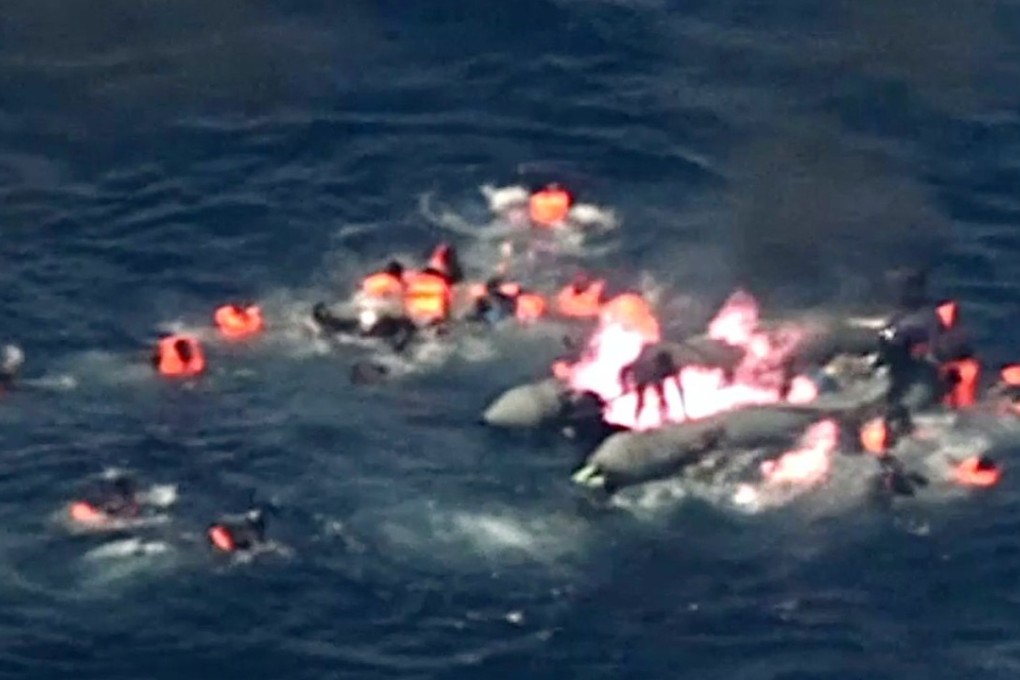 Video | Dramatic video shows rescue of migrants from burning boat off ...