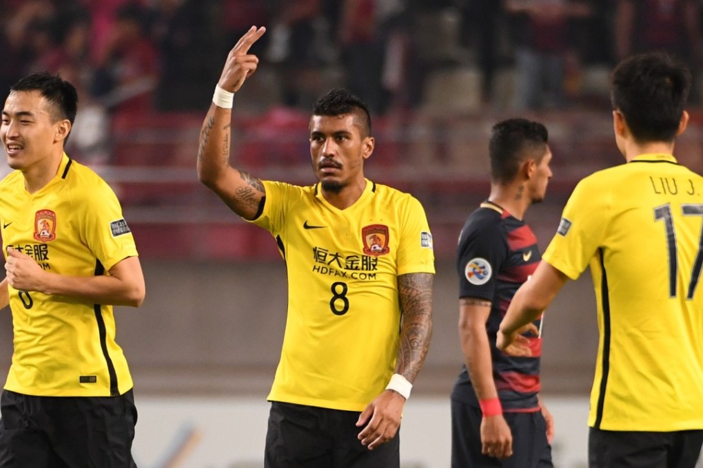 Guangzhou Evergrande midfielder Paulinho celebrates scoring the crucial goal during the AFC Champions League tie against Japan’s Kashima Antlers. Photo: AFP