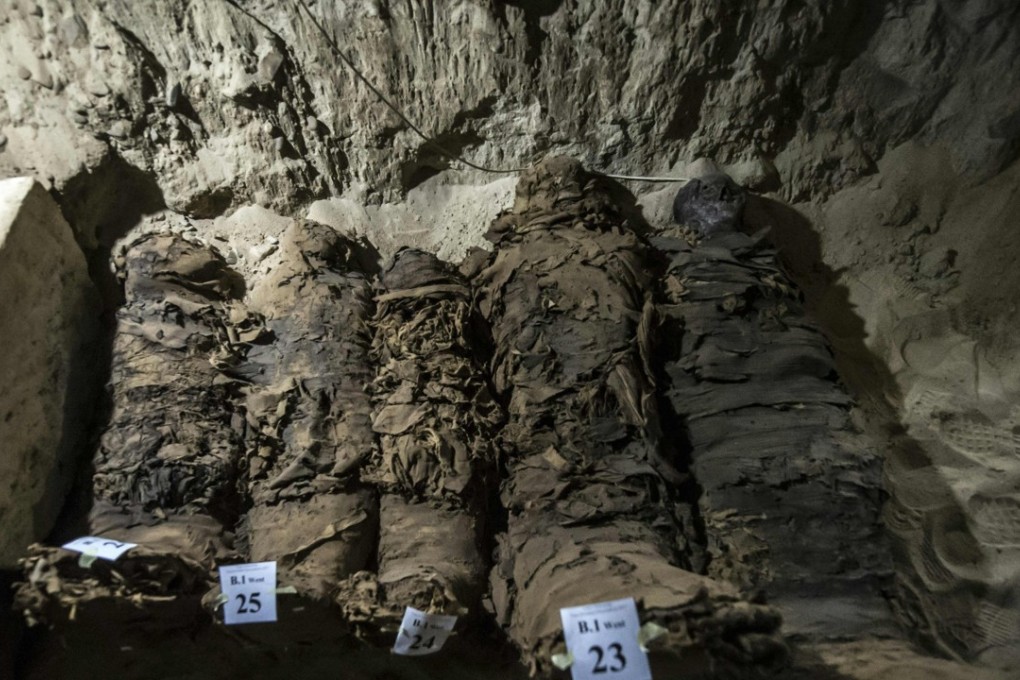A picture taken on May 13, 2017, shows mummies lying in catacombs following their discovery in the Touna el-Gabal district of the Minya province, in central Egypt. Photo: AFP