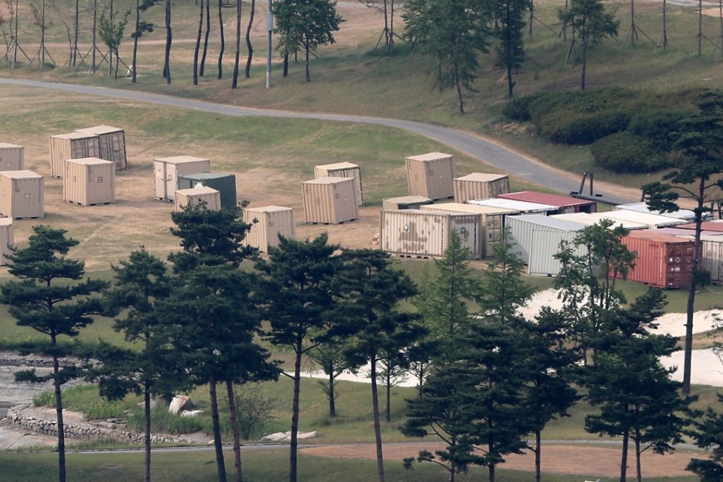 Containers believed to have equipment related to the US Terminal High Altitude Area Defence missile system (THAAD) at a golf course in Seongju, southeast of Seoul, South Korea. Photo: EPA