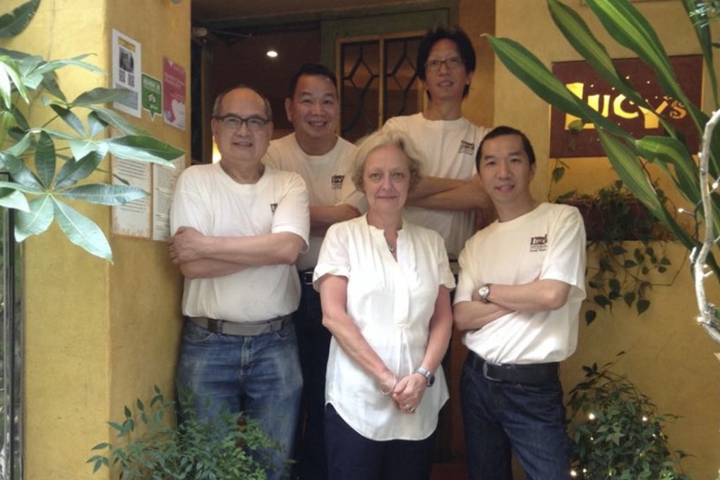 Lucy’s owner Lucy Humbert, manager Ricky Chan (front, right) and (rear, from left) staff Allen Chan, Gilbert Lo, and Jacky Yang. Lucy’s is closing in July after 23 years in business. Photo: courtesy of Lucy’s