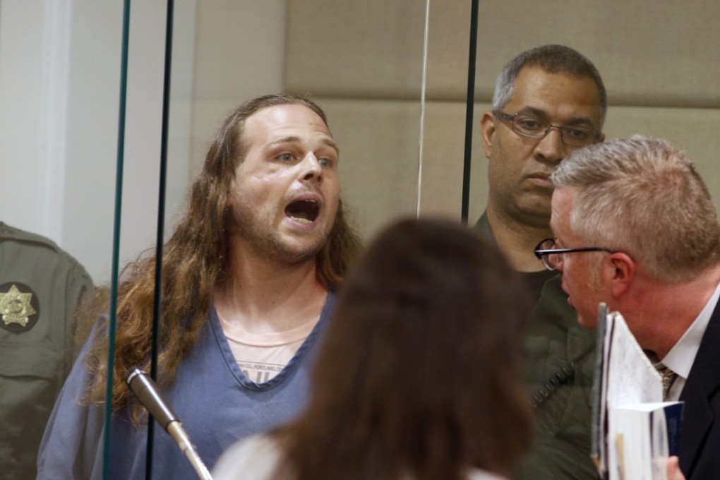 Jeremy Joseph Christian shouts as he is arraigned in Multnomah County Circuit Court in Portland, Oregon, on Tuesday. Authorities say Christian hurled anti-Muslim slurs at two young women, including one wearing a hijab. When three men on the train intervened, police say, Christian attacked them, killing two and wounding one. Photo: AP