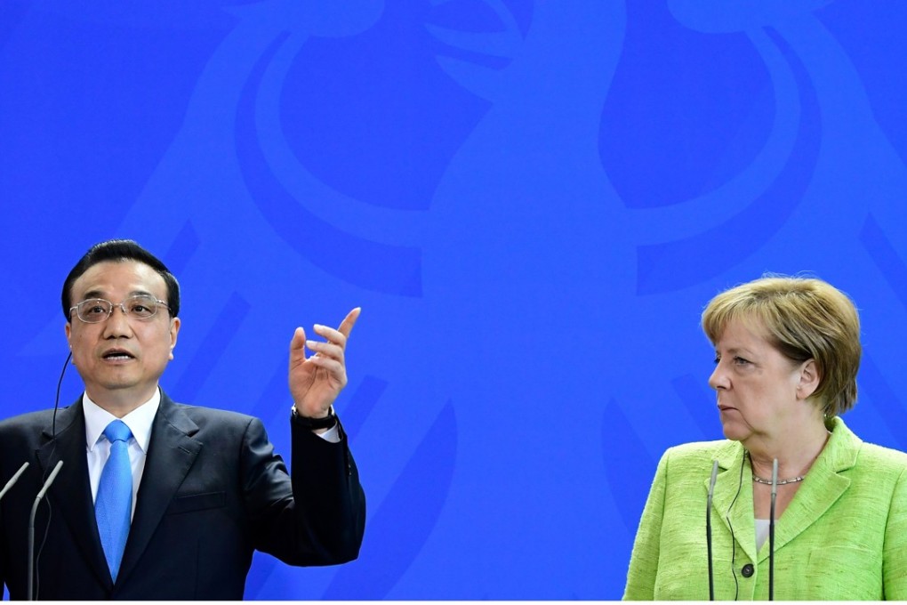 German Chancellor Angela Merkel and Chinese Prime Minister Li Keqiang give a press conference at the end of Li's two-day visit to Germany on Thursday. Photo: AFP