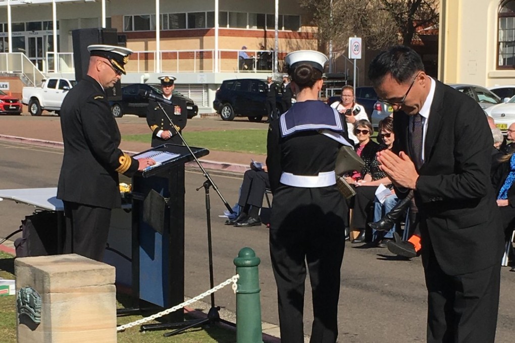 Japanese Consul General Keizo Takewaka lays a wreath at the HMAS Kuttabul Memorial site in Sydney. Photo: Kyodo