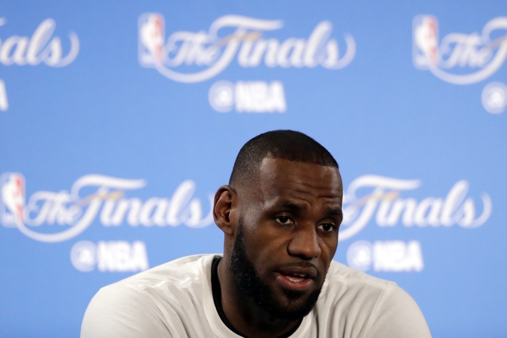 Cleveland Cavaliers’ LeBron James answers questions before practice on Wednesday. He discussed the racist assault he was victim of. Photo: AP