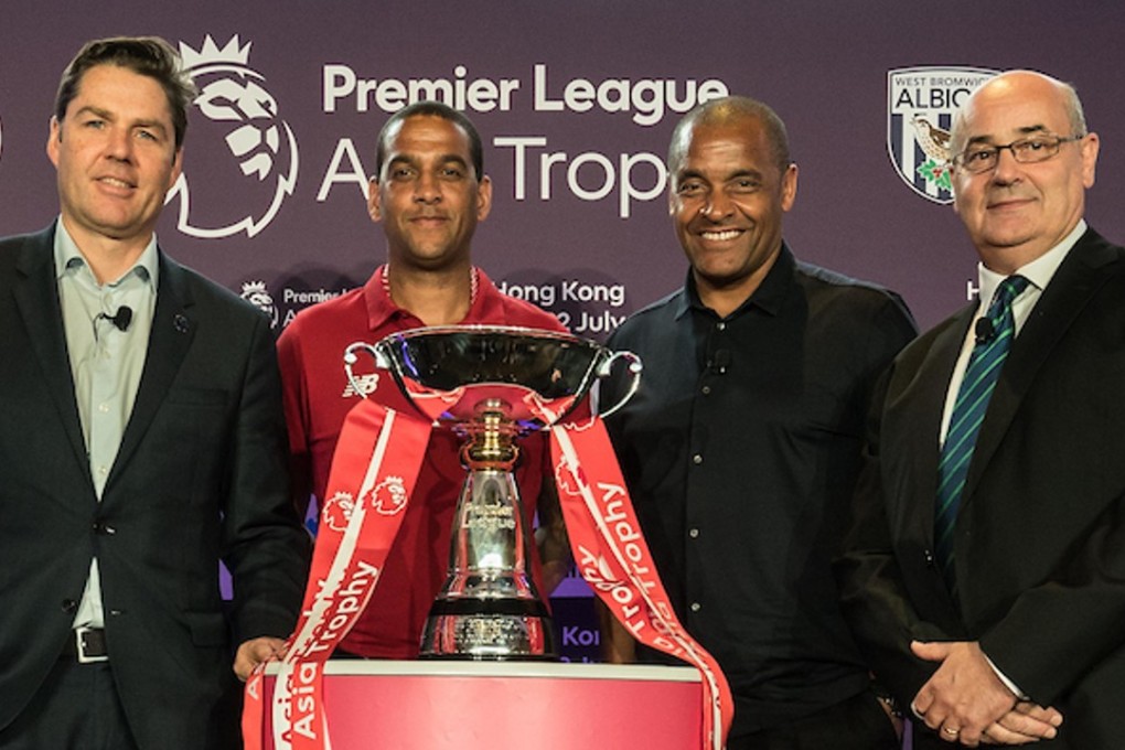 Premier League’s Richard Masters, ex-Liverpool player Phil Babb, Crystal Palace U23 coach Mark Bright and HKFA chief Mark Sutcliffe pose with the Asia Trophy at the launch event on Thursday. Photo: Premier League