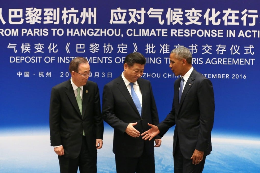 This file photo taken on September 2, 2016, shows Chinese President Xi Jinping (centre), former US President Barack Obama (right) and former UN Secretary General Ban Ki-moon shaking hands during a joint ratification of the Paris climate change agreement ceremony ahead of the G20 Summit at the West Lake State Guest House in Hangzhou. Photo: AFP