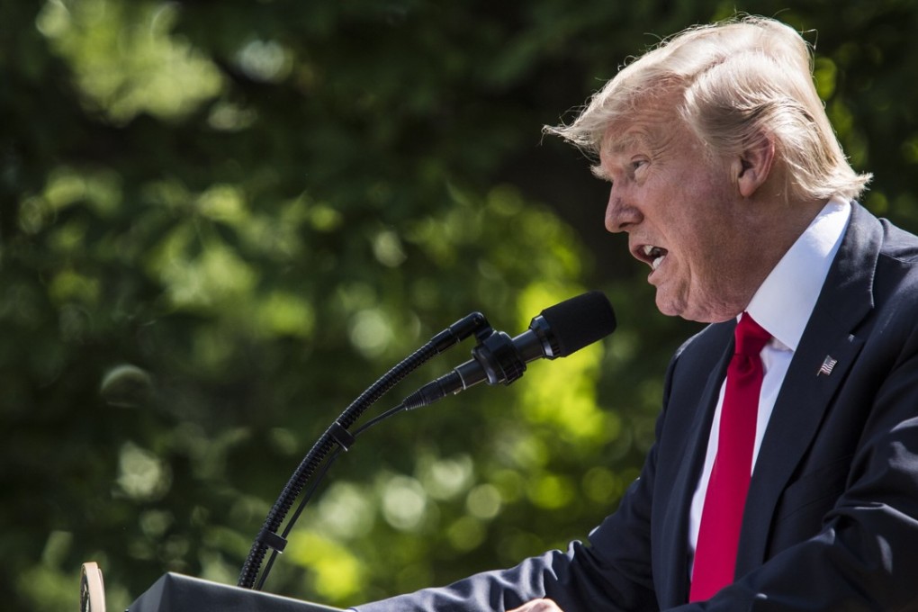 President Donald Trump announces that the US will withdraw from the Paris climate agreement Thursday, in the Rose Garden at the White House. Photo: Washington Post / Jabin Botsford