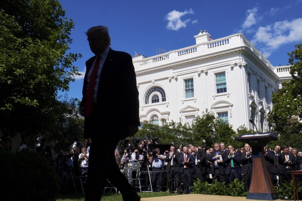US President Donald Trump exits following an announcement in the Rose Garden of the White House in Washington that the US would withdraw from the Paris climate pact. Photo: Bloomberg