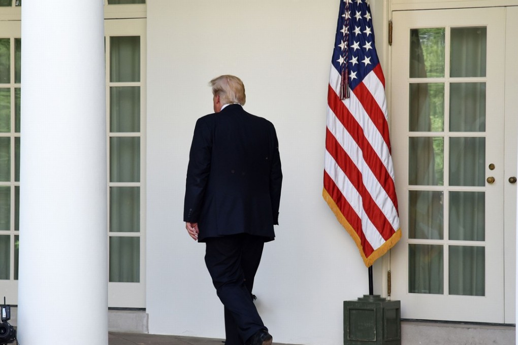 President Donald Trump leaves after making a statement the US is withdrawing from The Paris Climate Change Accord during an event in the Rose Garden of the White House, on June 1, 2017 in Washington, DC. Photo: Abaca Press/TNS