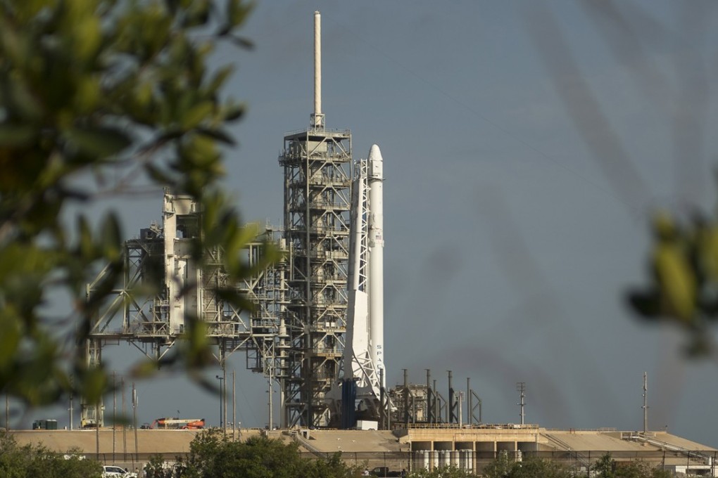 A handout photo made available by the National Aeronautics and Space Administration (NASA) on June 1, 2017 of the SpaceX Falcon 9 rocket, with the Dragon spacecraft onboard, shortly after being raised vertical at Launch Complex 39A at NASA's Kennedy Space Centre in Cape Canaveral, Florida. The launch was delayed by storms. Photo: EPA
