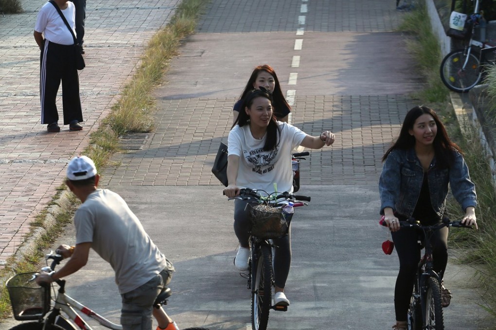 Cycling paths in the New Territories are popular, but using a bicycle on the city’s roads would be more problematic. Photo: Felix Wong