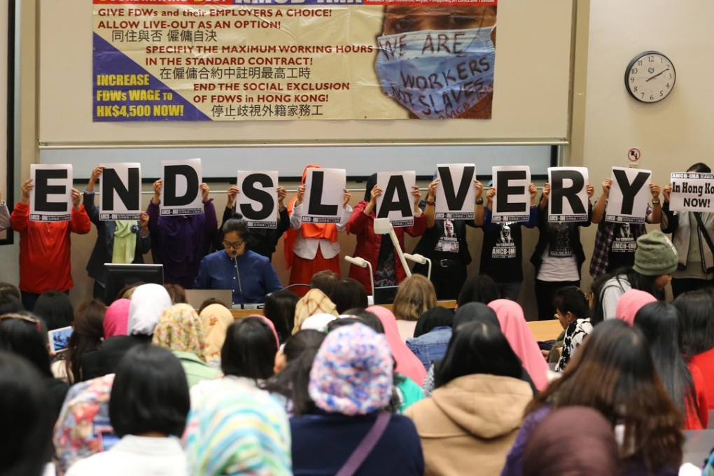 The Asian Migrants' Coordinating Body stage a protest against the plight of domestic helpers in Hong Kong. Photo: Felix Wong
