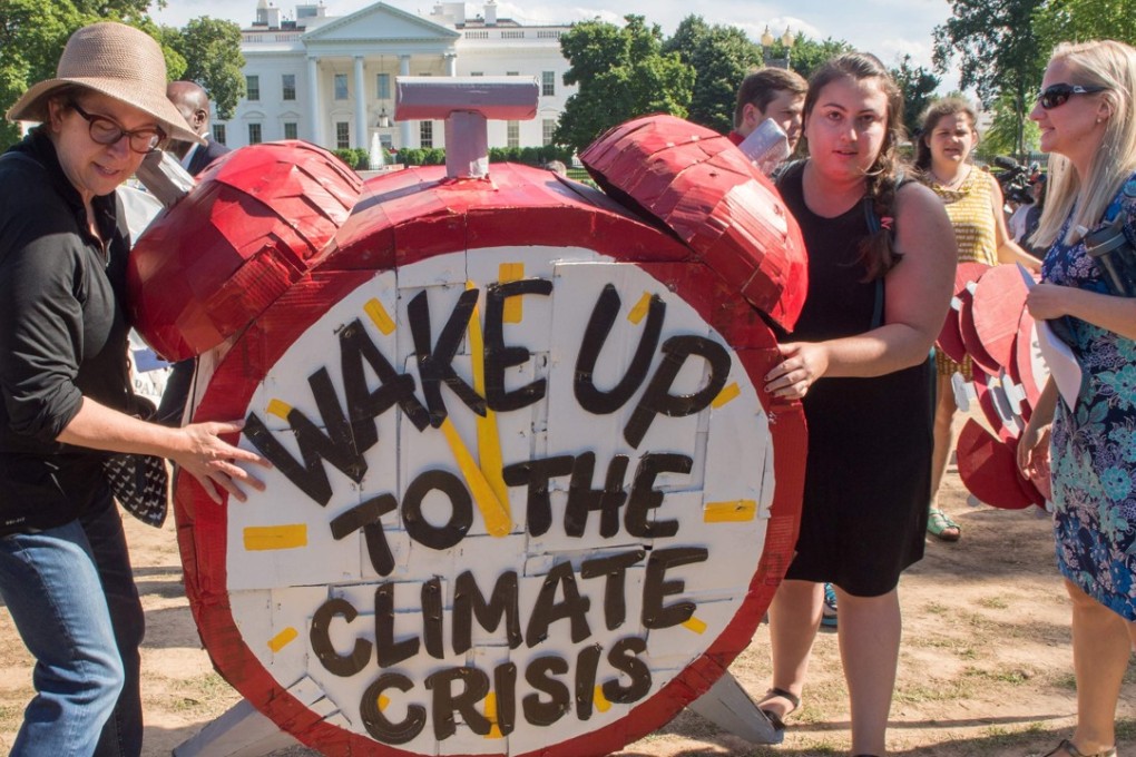 Protesters in Washington objecting to US President Donald Trump’s decision to withdraw from the Paris climate accord. The move opens the door to China assume leadership in the global fight against climate change. Photo: AFP
