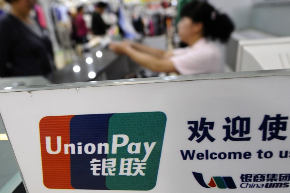 Chinese bank card operator UnionPay may soon have to defend its near monopoly against Visa and MasterCard thanks to the new US-China deal. Photo: Reuters