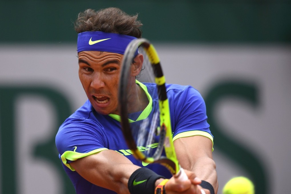 Rafael Nadal returns during his straight-sets win over Roberto Bautista Agut at the French Open. Photo: AFP