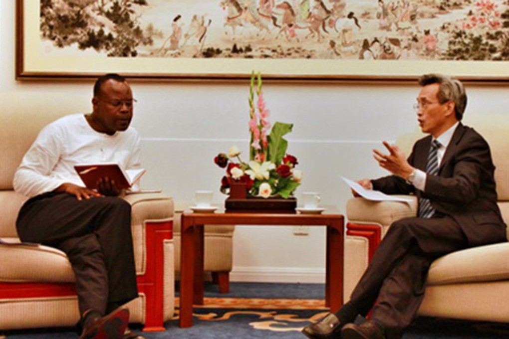 Zambia’s representative in China with Lin Songtian, the director for African affairs at the foreign ministry. Photo: Handout
