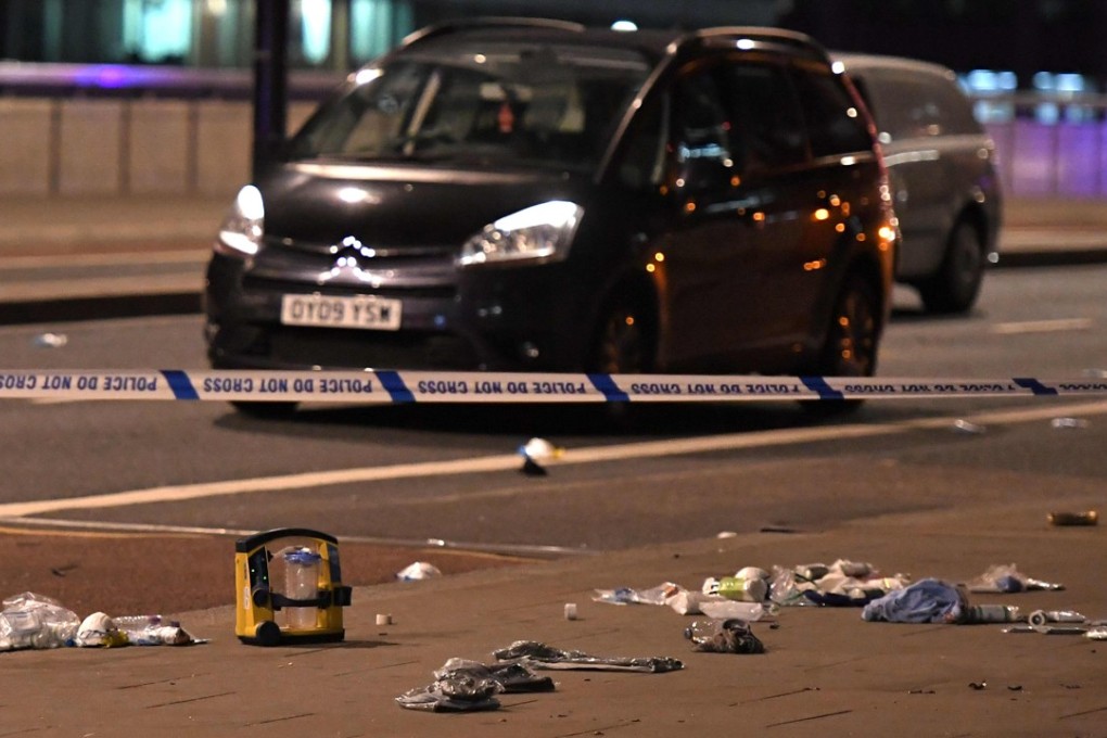 Debris and abandoned cars remain at the scene of an apparent terror attack in central London. Photo: AFP