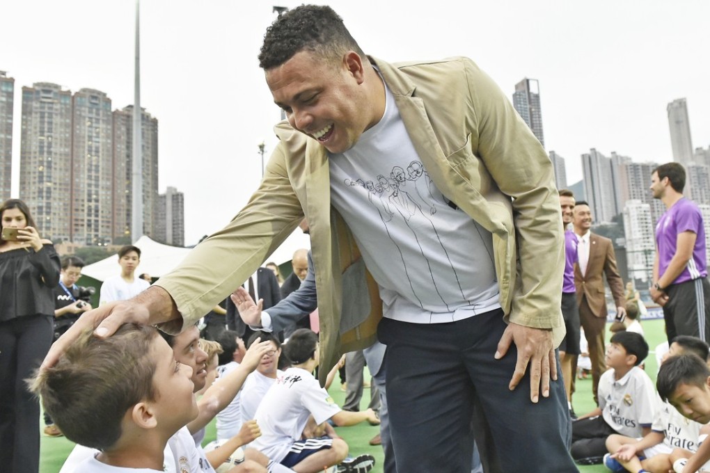 Ronaldo greets a young fan at the Real Madrid Foundation’s clinic at the Hong Kong Football Club in Happy Valley. Photo: Real Madrid Foundation